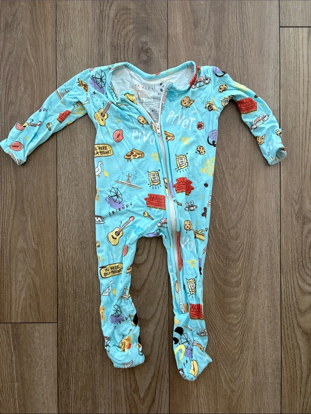 Light Blue Printed Footed One-Piece for Kids - All-Over Cartoon Motif